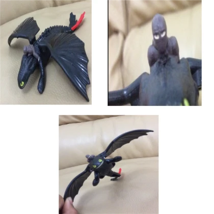toothless toy that flaps wings when touched skin 1